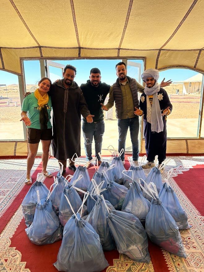 Adults taking picture after cleaning