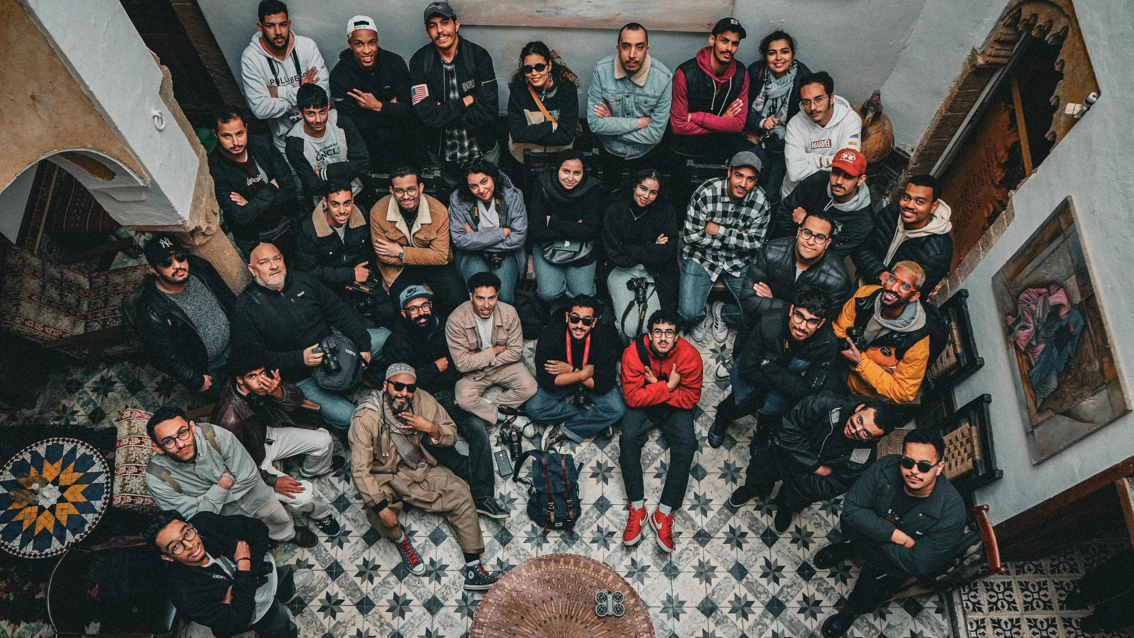 Person on sand dunes with sun shining